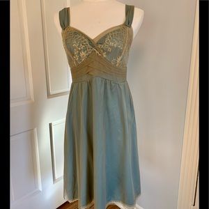 Cocktail dress with lace overlay